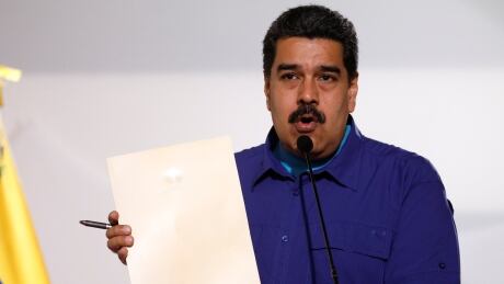 Venezuela's President Nicolas Maduro speaks to reporters before an event with supporters of Somos Venezuela in Caracas on Wednesday. VENEZUELA-POLITICS/MADURO