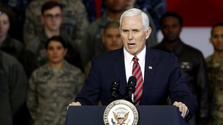 U.S. Vice President Mike Pence addresses members of U.S. military services and Japan Self-Defense Force (JSDF) before he departs for South Korea, at U.S. Air Force Yokota base in Fussa, on the outskirts of Tokyo, Japan, February 8, 2018. REUTERS/Toru Hanai - RC17FA11C040 JAPAN-USA/PENCE