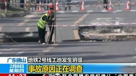 In this image taken from video footage run by China's CCTV via AP Video, officials work Thursday at the site of a road collapse in Foshan, southern China's Guangdong Province.<br />
<br />
<br />
China Construction Deaths