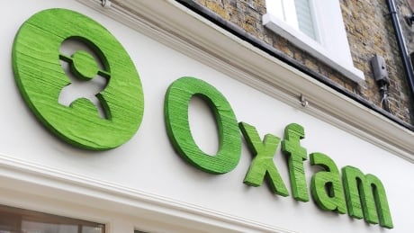 The British government is reviewing its relationship with the charity in the wake of sex allegations against some of the charity's ex-staff in Haiti. The Department for International Development took the decision after the charity denied claims it had covered up the use of prostitutes by aid workers in Haiti. Britain Oxfam Sex Scandal