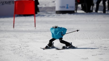 Robot Tae Kwon V skies during the Ski Robot Challenge at a ski resort in Hoenseong, South Korea, February 12, 2018. OLYMPICS-2018-ALPS/ROBOTS