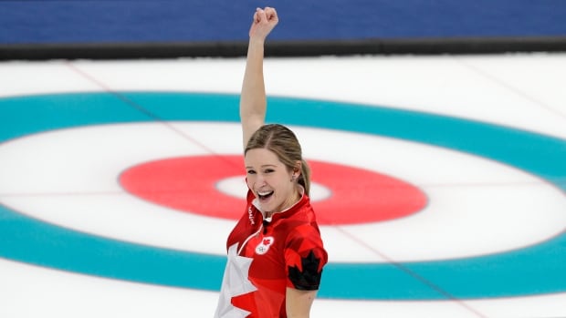 Canada's Kaitlyn Lawes celebrate after winning their mixed doubles curling match against Switzerland at the 2018 Winter Olympics in Gangneung South Korea Tuesday Feb. 13 2018. Canada won gold