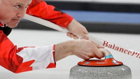 Canada's skip Kevin Koe held on to beat South Korea 7-6 on Friday. Pyeongchang Olympics Curling Men