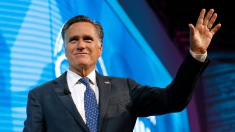 Former Republican presidential candidate Mitt Romney waves after speaking about the tech sector during an industry conference, in Salt Lake City, on Jan. 19, 2018. Romney announced his Utah Senate campaign on Thursday, Feb. 15, 2018. Utah Senate Romney