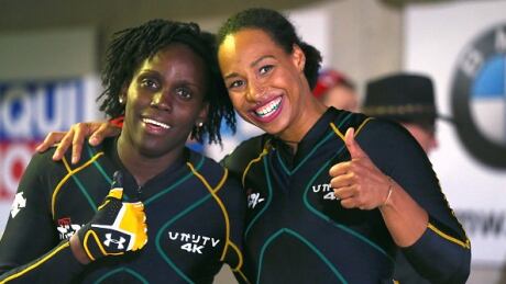 Bobsledders Jazmine Fenlator-Victorian, left, and Carrie Russell, right, of Jamaica, pictured in January, received a new sled from Red Stripe after their coach quit the team and took their old sled with her. fenlator-victorian-russell