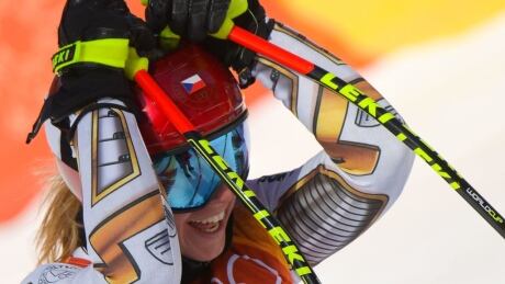 Czech Republic's Ester Ledecka reacts after crossing the finish line of the women's super-G. The snowboarder went on to win gold in the skiing event. ledecka-ester