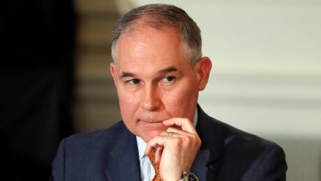 In this Feb. 12, 2018, file photo, Environmental Protection Agency Administrator Scott Pruitt attends a meeting with state and local officials and President Donald Trump at the White House in Washington. A Republican-led congressional committee is demanding records related to premium-class flights taken by Pruitt. EPA Pruitt Travel
