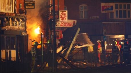 Members of the emergency services work at the site of an explosion that destroyed a convenience store and a home in Leicester, England, on Feb. 25, 2018. BRITAIN-POLICE/