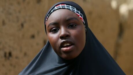 Amina Usman, a 15-year-old student, who was among the pupils who escaped the attack on the school, speaks in Dapchi in the northeastern state of Yobe, Nigeria February 23, 2018. REUTERS/Afolabi Sotunde - RC19270A9580 NIGERIA-SECURITY/