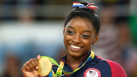 Rio gold medallist Simone Biles has returned to the U.S. gymnastics team following a year's hiatus. The 20-year-old is expected begin competing again sometime this year.
Biles-Simone-16082016