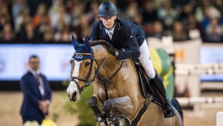 Belgium's Niels Bruynseels rides Gancia de Muze to victory in the Dutch Master: Rolex Grand Slam of Show Jumping on Sunday. bruynseels-niels