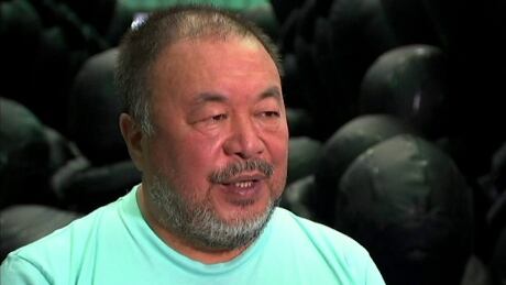 In this image made from a video, Chinese dissident artist Ai Weiwei speaks during his exhibition in Sydney, Monday, March 12, 2018. Ai said Monday that it doesn't matter whether or not China has a change in leadership, the culture and the system will always remain the same. He launched an exhibition in Sydney to highlight the international refugee crisis. (Australia Broadcasting Corporation via AP) Australia Ai Weiwei