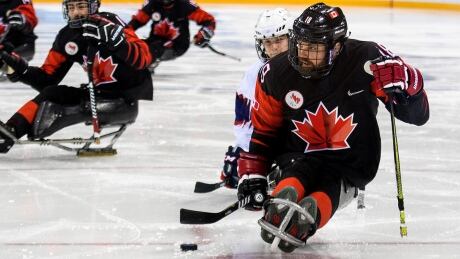 Canadian para ice hockey veteran Billy Bridges, right, has been chasing a second Paralympic gold medal for 12 years. Billy Bridges Canada Para Ice Hockey Paralympics