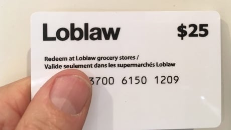 A $25 Loblaw gift card is shown in Oakville, Ont., Thursday, March 8, 2018. The federal privacy commission has asked Loblaw Companies Ltd. for more information following reports some customers have been asked for additional personal information to secure a $25 gift card related to the alleged bread price-fixing scandal. Loblaw Card Backlash 20180314