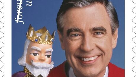 This image released by the U.S. Postal Service shows the Mister Rogers forever stamp which will go on sale on Friday, March 23. Fred Rogers, the gentle TV host who entertained and educated generations of preschoolers on “Mister Rogers’ Neighborhood," died in 2003 at age 74. (U.S. Postal Service via AP) Mister Rogers Stamp