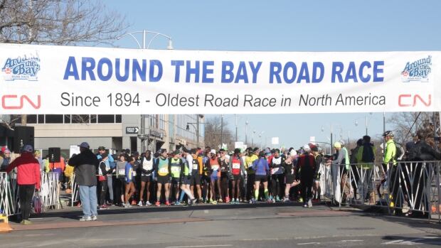 Runners line up at the start line of the 30-kilometre Around the Bay road race. This year marks its 124th year. 