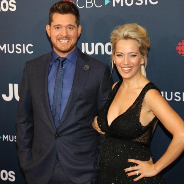 Buble with wife Luisana Lopilato
