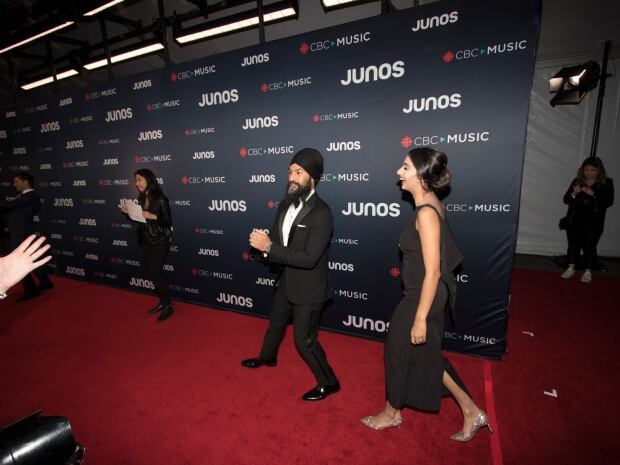 Federal NDP Leader Jagmeet Singh and Gurkiran Kaur arrive on the red carpet at the Juno Awards in Va
