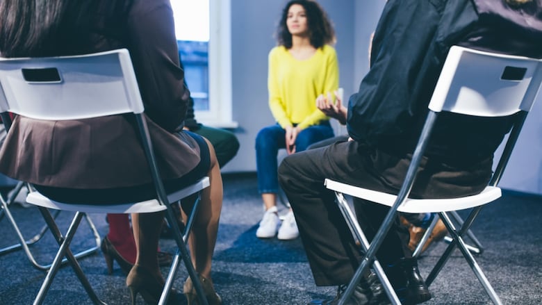 People having group therapy