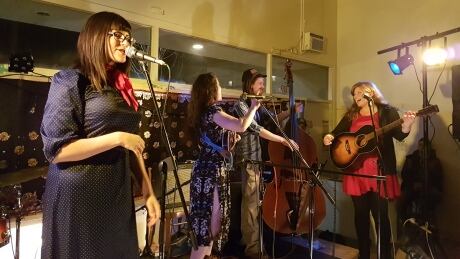 Britt Meierhofer (left) on-stage at the Good Egg Records launch party in Prince George, B.C., alongside Amy Blanding, Brin Porter and Naomi Kavka. Britt Meierhofer