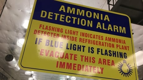 Signs like this one at the Denman Arena in Vancouver are a required safety measure. Rink ammonia warning sign, Denman Arena