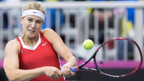 Eugenie Bouchard of Canada returns to Kateryna Bondarenko of Ukraine during their Fed Cup tennis match on Saturday. bouchard-eugenie-042118