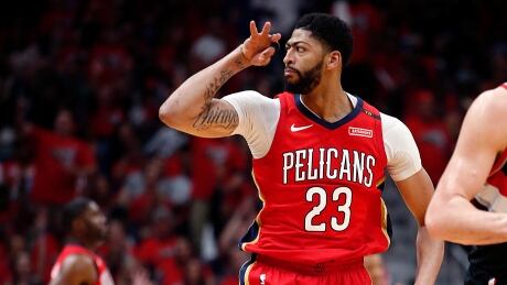 New Orleans forward Anthony Davis reacts after making a three-point shot during the first half of the Pelicans' Game 4 win over the Portland Trail Blazers on Saturday. davis-anthony-042118