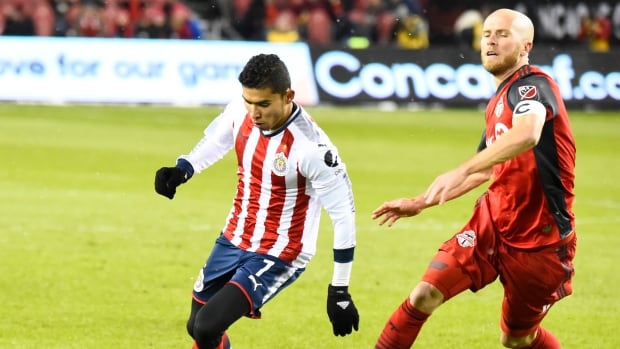 Toronto FC's Michael Bradley, right, an American, calls his adopted city one of the best in the world. 99832948