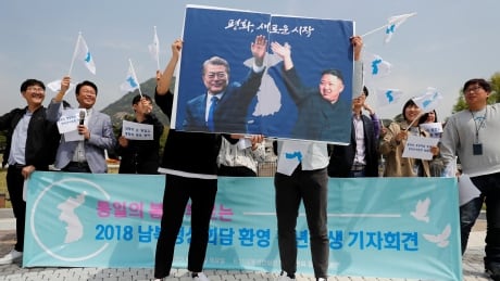Students on Thursday held posters in Seoul with pictures of South Korea's President Moon Jae-in and North Korea's leader Kim Jong-un during a pro-unification rally ahead of the upcoming summit.
NORTHKOREA-SOUTHKOREA/