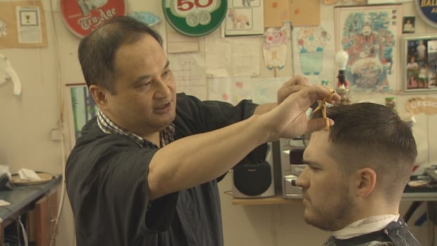 'I won't give up my name,' says local barber of demand from national chain | CBC News
