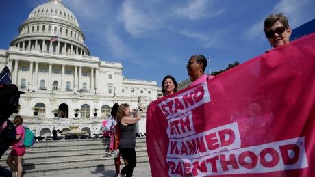 Healthcare activists with Planned Parenthood and the Center for American Progress protest in opposition to the Senate Republican healthcare bill on Capitol Hill in Washington, U.S., June 28, 2017. USA-HEALTHCARE/PROTEST
