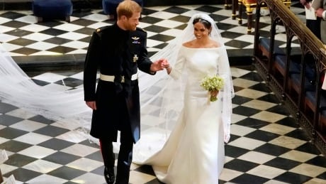 Prince Harry and Meghan Markle leave after their wedding ceremony at St. George's Chapel in Windsor Castle on May 19, 2018. Harry and Meghan chapel aisle