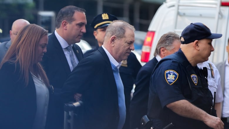 What Books Did Harvey Weinstein Carry on His Perp Walk?