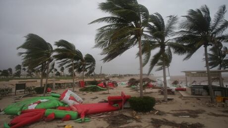 Debris litter a beach after Cyclone Mekunu in Salalah, Oman, Saturday, May 26, 2018. Cyclone Mekunu blew into the Arabian Peninsula early Saturday, drenching arid Oman and Yemen with rain, cutting off power lines, officials said. (AP Photo/Kamran Jebreili) Oman Cyclone