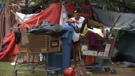 A homeless camp that sprang up on the lawn of West Broadway's All Saints Church about a month ago was being taken down on Wednesday. Homeless camp All Saints Church