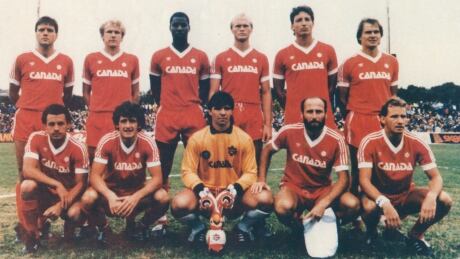 The Canadians, including goalkeeper Tony Letteiri's good luck stuff parrot Ozzie, pose for a team picture ahead of their qualification-clinching game against Hounduras in St. John's on September 14, 1985.
Canada Team Photo - 1985