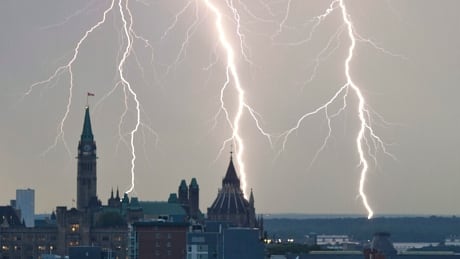 Lightning strikes behind Parliament Hill in Ottawa on Tuesday, Sept 7, 2010. Weather 20100907