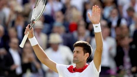 Novak Djokovic advances at the Fever-Tree Championships after downing Grigor Dimitrov in straight sets. Djokovic advances to quarter-finals in London