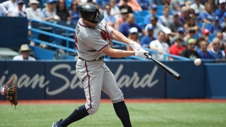 Atlanta's Peter Bourjos hits a solo home run against the Blue Jays on Wednesday. 100366447