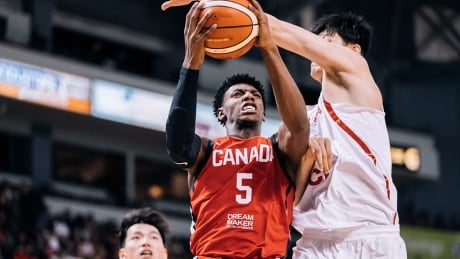 R.J. Barrett, left, scored a game-high 21 points as Canada beat China for the second time in a row. R.J. Barrett Canada China Basketball