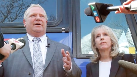 Ontario Progressive Conservative leader Doug Ford and Kanata-Carleton PC candidate Merrilee Fullerton speak to reporters a rally at Alice's Village Cafe as part of his Ontario provincial election campaign in Carp, Ontario on Wednesday, May 9, 2018. Merrilee Fullerton Doug Ford 20180509