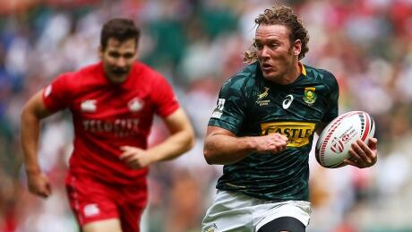 LONDON, ENGLAND - JUNE 02: Werner Kok of South Africa breaks free to score a try on day one of the HSBC London Sevens at Twickenham Stadium on June 2, 2018 in London, United Kingdom. (Photo by Jordan Mansfield/Getty Images) rugby-sevens-men-1180