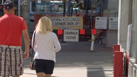 'Sidewalk closed': Busy construction steers pedestrians on multiple detours thumbnail