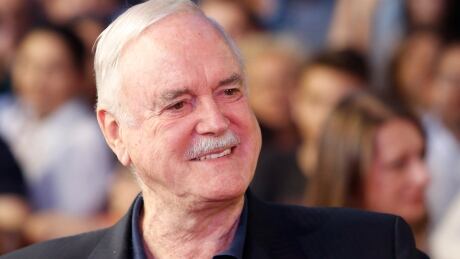 English actor John Cleese poses for photo as he walks on the red carpet to receive Sarajevo Film Festival's top honour award, the Heart of Sarajevo Award, in Sarajevo, Bosnia, on Wednesday, Aug. 16, 2017. Bosnia John Cleese