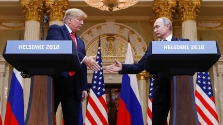 U.S. President Donald Trump and Russia's President Vladimir Putin shake hands during a joint news conference after their meeting in Helsinki, Finland, July 16, 2018. USA-RUSSIA/SUMMIT