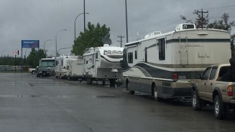The director of corporate affairs for Walmart Canada says RVs will soon no longer be welcome to camp in the store parking lot because customers are complaining about unsafe parking and debris. Whitehorse Walmart