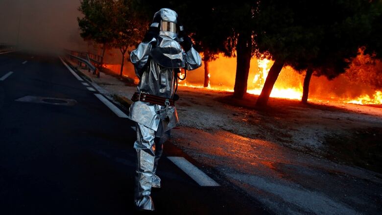 At least 60 dead in Greece as 'killer' wildfire rages