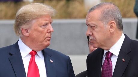U.S. President Donald Trump, left, talks to Turkish President Recep Tayyip Erdogan, right at NATO headquarters in Brussels, Belgium on July 11. Despite meeting several times, including last year at the White House, the leaders have not settled a number of issues of disagreement. Trump-Erdogan