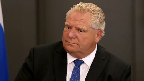 Ontario Premier Doug Ford looks on during an intergovernmental meeting in the wake of a mass shooting which happened in Toronto Sunday night, at Toronto City Hall on Monday, July 23, 2018. THE CANADIAN PRESS/Nick Kozak Toronto Shooting 20180723