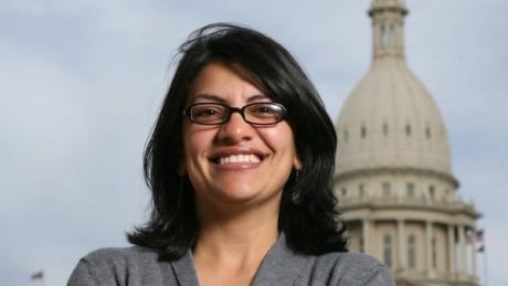 In this Thursday, Nov. 6, 2008 file photo, Rashida Tlaib, a Democrat, is photographed outside the Michigan Capitol in Lansing, Mich. In the primary election Tuesday, Aug. 7, 2018, Democrats pick former Michigan state Rep. Rashida Tlaib to run unopposed for the congressional seat that former Rep. John Conyers held for more than 50 years. Tlaib would be the first Muslim woman in Congress. Rashida Tlaib